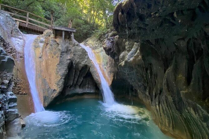 Hike, Swim and Enjoy Nature's Paradise in Damajagua Waterfalls - Sliding the natural rock: the famous waterslide and smooth slides