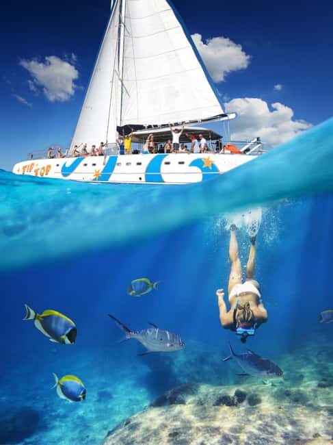 Puerto Plata: Sosúa Catamaran Day Trip with Lunch and Drinks - Step Aboard the Tip Top Catamaran in Sosúa