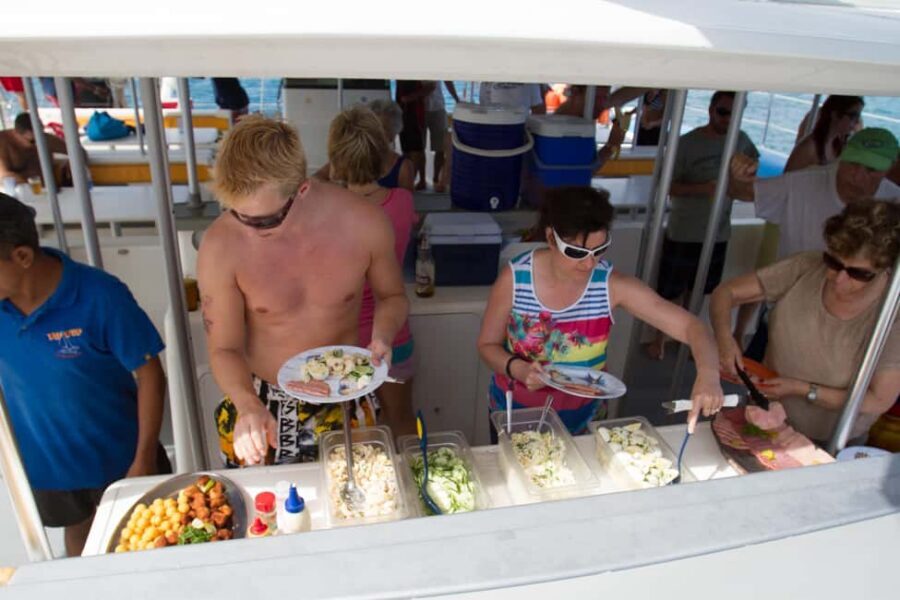 Puerto Plata: Sosúa Catamaran Day Trip with Lunch and Drinks - Unlimited Drinks, Lunch, and the Onboard Party Energy
